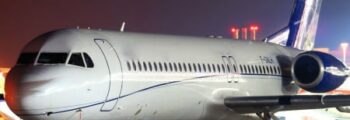 location jet privé: METRO III en vol, ciel partiellement nuageux.