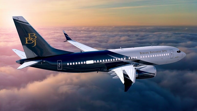 Location de jet privé : BBJ au coucher du soleil.